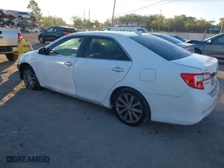 2014 Toyota Camry Hybrid LE with VIN 4T1BD1FK7EU114178, listed as a IAAI auction lot 41833139 with 175,117 mi miles. Bid and sale history available at carsss.com. Image 3.