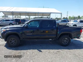 2018 Toyota Tacoma SR5 with VIN 3TMAZ5CN1JM061127, listed as a IAAI auction lot 42012247 with 119,381 mi miles and . Bid and sale history available at DreamBid. Image 14.