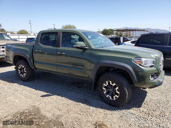 2021 Toyota Tacoma 4WD SR with VIN 3TMCZ5AN2MM378155, listed as a Copart auction lot 49007625 with 43,442 mi miles and Salvage Title. Bid and sale history available at carsss.com. Image 4.