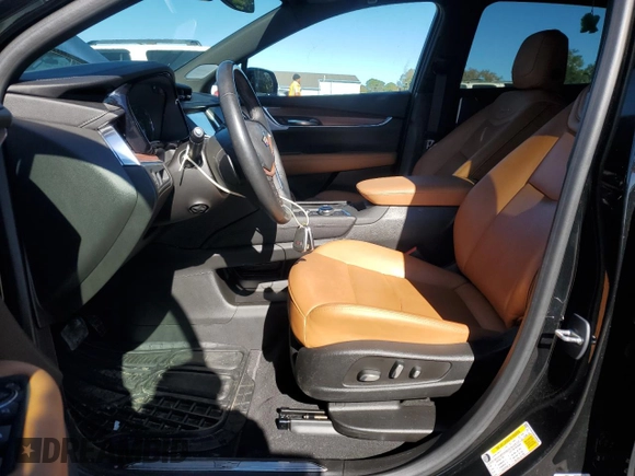 2023 Cadillac XT5 FWD Premium Luxury with VIN 1GYKNCR40PZ189444, listed as a Copart auction lot 84803094 with 22,827 mi miles and Clean Title. Bid and sale history available at carsss.com. Image 7.