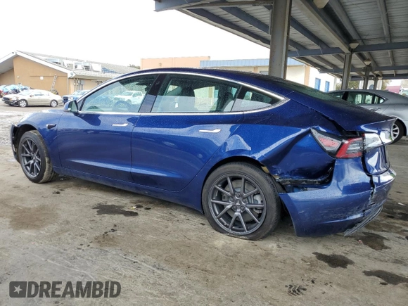 2020 Tesla Model 3 Standard Range Plus with VIN 5YJ3E1EA1LF631139, listed as a Copart auction lot 49161805 with 58,140 mi miles and Salvage Title. Bid and sale history available at DreamBid. Image 2.