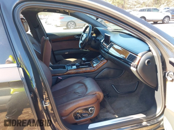 2011 Audi A8 with VIN WAURVAFDXBN014290, listed as a IAAI auction lot 40860777 with 152,584 mi miles and . Bid and sale history available at DreamBid. Image 5.