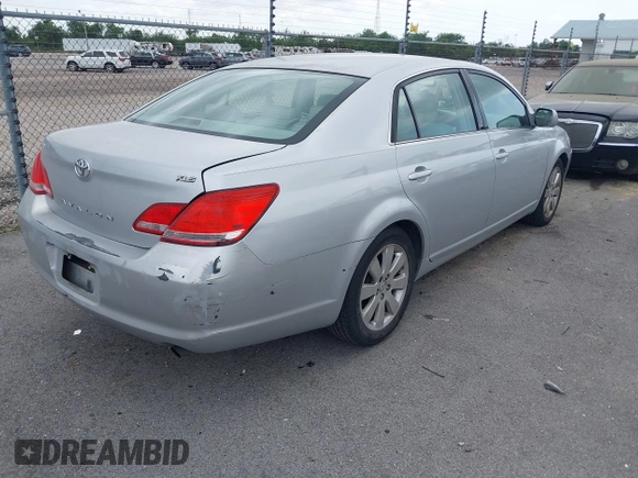 2007 Toyota Avalon XL with VIN 4T1BK36B47U191188, listed as a IAAI auction lot 42127335 with 213,701 mi miles. Bid and sale history available at carsss.com. Image 4.