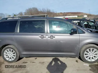 2013 Toyota Sienna LE with VIN 5TDJK3DC8DS056730, listed as a IAAI auction lot 41141247 with 166,579 mi miles and . Bid and sale history available at DreamBid. Image 13.