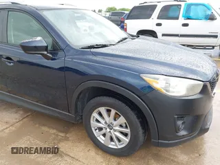 2015 Mazda CX-5 Touring with VIN JM3KE2CY5F0449195, listed as a IAAI auction lot 41894567 with 124,694 mi miles and . Bid and sale history available at DreamBid. Image 17.
