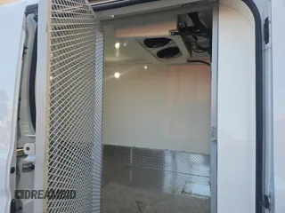 2019 Ford Transit with VIN 1FTYR2CM0KKA98621, listed as a Copart auction lot 60940125 with 77,075 mi miles and Salvage title. Bid and sale history available at DreamBid. Image 6.