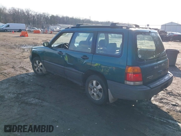 1999 Subaru Forester L with VIN JF1SF635XXH735202, listed as a IAAI auction lot 41489355 with 290,000 mi miles. Bid and sale history available at carsss.com. Image 3.