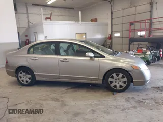 2006 Honda Civic LX z VIN 1HGFA16556L005459, wystawiony jako IAAI lot #41940768 z przebiegiem 178 595 mil mil oraz . Historia ofert i sprzedaży dostępna na DreamBid. Obrazek 13.