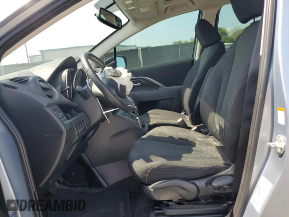 2012 Mazda 5 Touring with VIN JM1CW2CL0C0104148, listed as a Copart auction lot 61018845 with 147,222 mi miles and Salvage title. Bid and sale history available at DreamBid. Image 7.