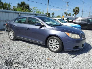 2013 Buick LaCrosse with VIN 1G4GA5ER6DF255587, listed as a Copart auction lot 51775185 with 57,572 mi miles and Salvage title. Bid and sale history available at DreamBid. Image 4.