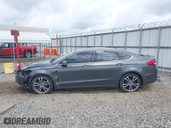 2017 Ford Fusion Titanium with VIN 3FA6P0K98HR363360, listed as a IAAI auction lot 42461432 with 182,807 mi miles and . Bid and sale history available at DreamBid. Image 14.