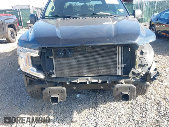 2020 Ford F-150 XL z VIN 1FTEW1C56LKD25620, wystawiony jako IAAI lot #40722456 z przebiegiem 104 333 mil mil oraz . Historia ofert i sprzedaży dostępna na DreamBid. Obrazek 6.