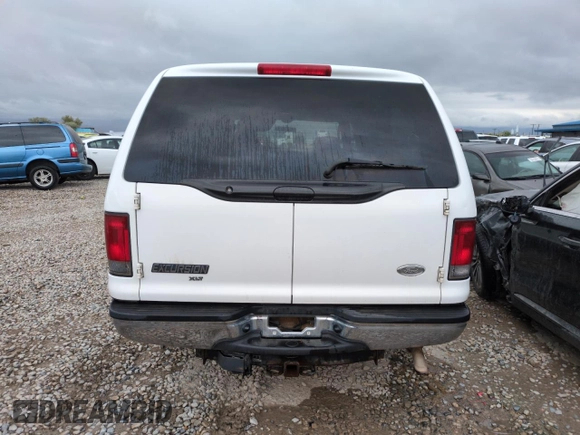 2004 Ford Excursion Special Serv with VIN 1FMNU41L04EB33694, listed as a Copart auction lot 55959735 with 183,692 mi miles and Salvage title. Bid and sale history available at DreamBid. Image 6.