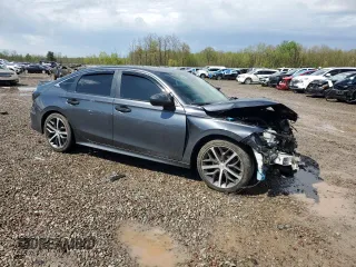 2022 Honda Civic Touring z VIN 2HGFE1F91NH304319, wystawiony jako Copart lot #55896485 z przebiegiem 56 476 mil mil oraz Szkody całkowita. Historia ofert i sprzedaży dostępna na DreamBid. Obrazek 4.