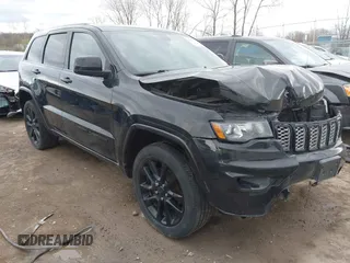 2017 Jeep Grand Cherokee Laredo with VIN 1C4RJFAG7HC886640, listed as a IAAI auction lot 42035301 with 197,110 mi miles. Bid and sale history available at carsss.com. Image 1.