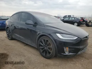 2016 Tesla Model X 70D z VIN 5YJXCAE28GF008476, wystawiony jako Copart lot #53448105 z przebiegiem Nie podano mil oraz Szkody całkowita. Historia ofert i sprzedaży dostępna na DreamBid. Obrazek 4.