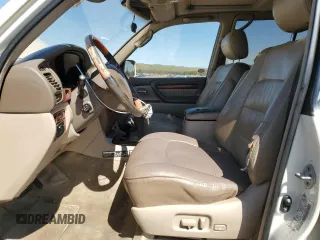 2000 Lexus LX 470 z VIN JT6HT00W1Y0096061, wystawiony jako Copart lot #52499155 z przebiegiem 199 914 mil mil oraz Tytuł czysty. Historia ofert i sprzedaży dostępna na DreamBid. Obrazek 7.