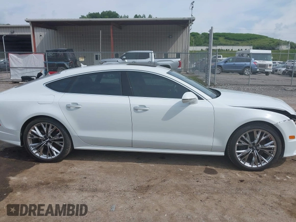 2016 Audi A7 Prestige with VIN WAU2GAFC4GN043343, listed as a IAAI auction lot 42380383 with 75,087 mi miles and . Bid and sale history available at DreamBid. Image 14.