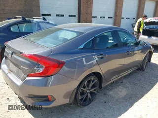 2019 Honda Civic Sport with VIN 19XFC2F88KE028035, listed as a IAAI auction lot 42000936 with 51,666 mi miles and . Bid and sale history available at DreamBid. Image 4.