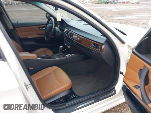 2010 BMW 3 Series 328i with VIN WBAPH7G51ANM52218, listed as a IAAI auction lot 41066937 with 129,932 mi miles and . Bid and sale history available at carsss.com. Image 5.