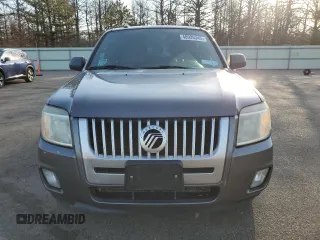 2010 Mercury Mariner z VIN 4M2CN9B70AKJ28137, wystawiony jako Copart lot #48926345 z przebiegiem 100 975 mil mil oraz Szkody całkowita. Historia ofert i sprzedaży dostępna na DreamBid. Obrazek 5.