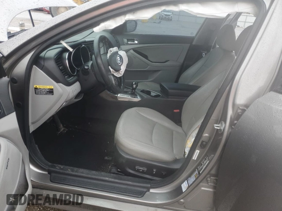 2015 Kia Optima EX with VIN 5XXGN4A76FG391259, listed as a Copart auction lot 49812355 with 124,704 mi miles and Salvage Title. Bid and sale history available at carsss.com. Image 7.