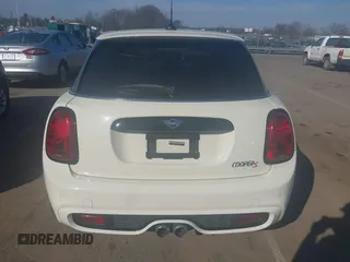 2021 MINI Hardtop 4 Door Cooper S with VIN WMWXU9C00M2P04693, listed as a IAAI auction lot 41785185 with 57,848 mi miles and . Bid and sale history available at DreamBid. Image 16.