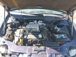 1998 Ford Taurus LX with VIN 1FAFP52U0WA226924, listed as a IAAI auction lot 41702083 with 55,998 mi miles. Bid and sale history available at carsss.com. Image 10.
