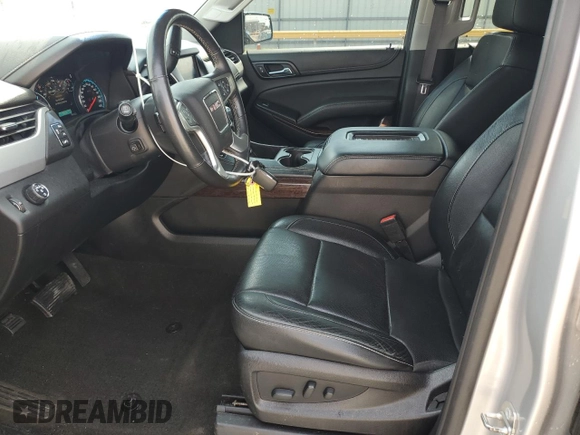 2017 GMC Yukon SLT z VIN 1GKS1BKC4HR375877, wystawiony jako Copart lot #55150545 z przebiegiem 144 788 mil mil oraz Szkoda całkowita • Salvage title. Historia ofert i sprzedaży dostępna na DreamBid. Obrazek 7.