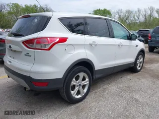 2013 Ford Escape SE with VIN 1FMCU0GX7DUB24877, listed as a IAAI auction lot 42038426 with 126,207 mi miles. Bid and sale history available at carsss.com. Image 4.