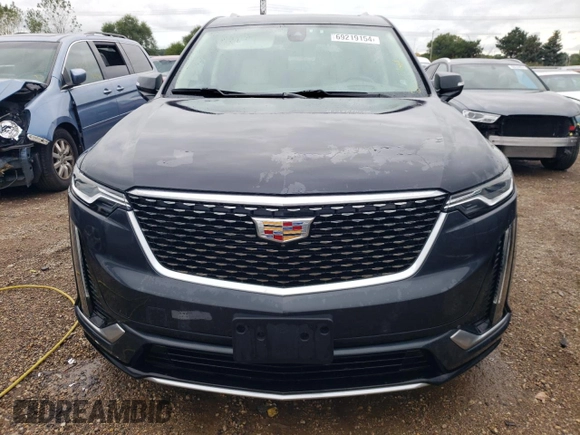 2021 Cadillac XT6 Premium Luxury with VIN 1GYKPDRS0MZ234814, listed as a Copart auction lot 69219154 with 25,493 mi miles and Salvage Title. Bid and sale history available at carsss.com. Image 5.