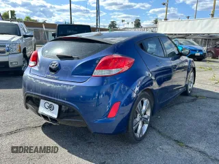 2016 Hyundai Veloster with VIN KMHTC6ADXGU263653, listed as a Copart auction lot 52216935 with 103,791 mi miles and Clean Title. Bid and sale history available at carsss.com. Image 4.