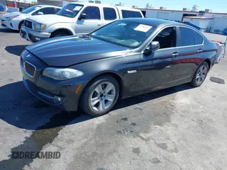 2013 BMW 5 Series 528i with VIN WBAXG5C58DD232582, listed as a IAAI auction lot 41890082 with 150,401 mi miles and . Bid and sale history available at carsss.com. Image 2.