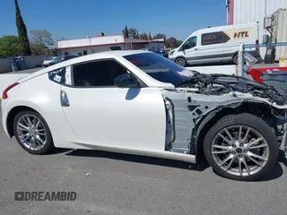 2018 Nissan 370Z Sport with VIN JN1AZ4EH3JM571169, listed as a IAAI auction lot 41859730 with 85,428 mi miles and . Bid and sale history available at DreamBid. Image 13.