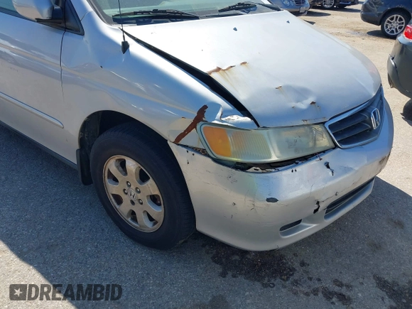 2002 Honda Odyssey EX-L z VIN 5FNRL18062B011890, wystawiony jako IAAI lot #41972294 z przebiegiem 245 889 mil mil oraz . Historia ofert i sprzedaży dostępna na DreamBid. Obrazek 6.