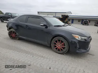 2014 Scion tC z VIN JTKJF5C72E3066945, wystawiony jako Copart lot #56125905 z przebiegiem Nie podano mil oraz Szkoda całkowita • Salvage title. Historia ofert i sprzedaży dostępna na DreamBid. Obrazek 4.