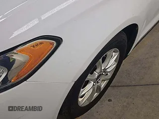 2015 Ford Fusion S with VIN 1FA6P0G7XF5127770, listed as a IAAI auction lot 42845978 with 150,942 mi miles and . Bid and sale history available at DreamBid. Image 14.