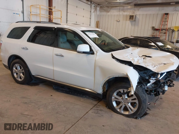 2013 Dodge Durango Crew with VIN 1C4RDHDG5DC553913, listed as a IAAI auction lot 42227189 with 209,703 mi miles and . Bid and sale history available at DreamBid. Image 1.