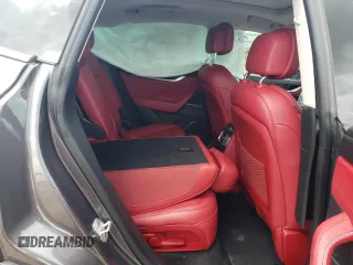 2017 Maserati Levante S z VIN ZN661YUS3HX196812, wystawiony jako Copart lot #69257744 z przebiegiem Nie podano mil oraz Szkoda całkowita • Salvage title. Historia ofert i sprzedaży dostępna na DreamBid. Obrazek 11.