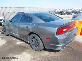2012 Dodge Charger SE with VIN 2C3CDXBG9CH145756, listed as a IAAI auction lot 41868784 with 201,801 mi miles. Bid and sale history available at carsss.com. Image 3.