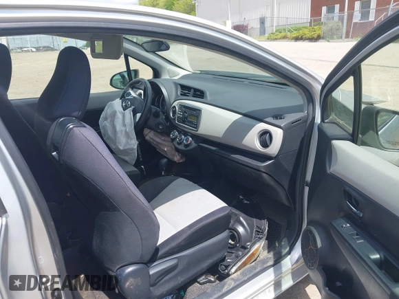 2014 Toyota Yaris L with VIN JTDJTUD38ED587118, listed as a IAAI auction lot 42211424 with 94,616 mi miles and . Bid and sale history available at DreamBid. Image 5.