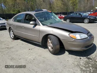 2003 Ford Taurus SEL Deluxe with VIN 1FAHP56SX3G199970, listed as a Copart auction lot 53042795 with 212,802 mi miles and Salvage Title. Bid and sale history available at DreamBid. Image 4.
