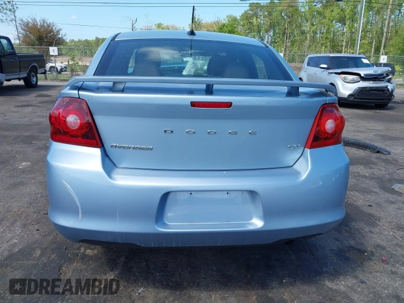 2013 Dodge Avenger SXT with VIN 1C3CDZCB0DN521591, listed as a IAAI auction lot 41891451 with 100,234 mi miles and . Bid and sale history available at carsss.com. Image 16.