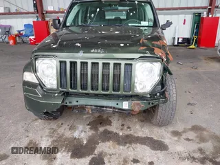 2008 Jeep Liberty Sport with VIN 1J8GN28K98W232003, listed as a IAAI auction lot 42127476 with 129,286 mi miles. Bid and sale history available at carsss.com. Image 12.