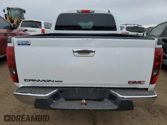 2011 GMC Canyon z VIN 1GTD5NF95B8101500, wystawiony jako Copart lot #84246754 z przebiegiem 130 506 mil mil oraz Szkoda całkowita • Salvage title. Historia ofert i sprzedaży dostępna na DreamBid. Obrazek 6.