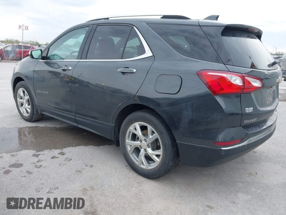 2021 Chevrolet Equinox Premier z VIN 2GNAXNEV9M6140537, wystawiony jako IAAI lot #42016514 z przebiegiem 52 237 mil mil oraz . Historia ofert i sprzedaży dostępna na DreamBid. Obrazek 3.