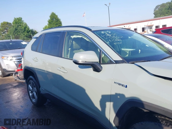2021 Toyota RAV4 Hybrid LE with VIN JTMB6RFV3MD038562, listed as a IAAI auction lot 42576852 with 27,463 mi miles and . Bid and sale history available at DreamBid. Image 12.