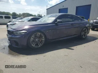2015 BMW M4 with VIN WBS3R9C54FK330356, listed as a Copart auction lot 61446515 with 97,248 mi miles and Salvage title. Bid and sale history available at DreamBid. Image 1.