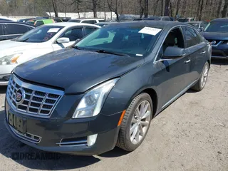 2013 Cadillac XTS Premium with VIN 2G61S5S33D9113653, listed as a IAAI auction lot 41837117 with 101,049 mi miles and . Bid and sale history available at DreamBid. Image 16.