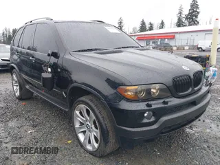 2005 BMW X5 4.8is with VIN 5UXFA93515LE82570, listed as a IAAI auction lot 41759657 with 212,687 mi miles. Bid and sale history available at carsss.com. Image 6.
